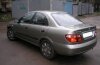 Nissan Almera ( ) 2006 ..