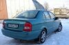 Mazda Protege ( ) 2001 ..