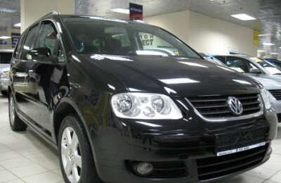 Volkswagen Touran ( ) 2003 ..