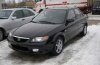 Mazda 323 ( 323) 2003 ..