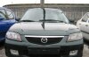 Mazda 323 ( 323) 2003 ..